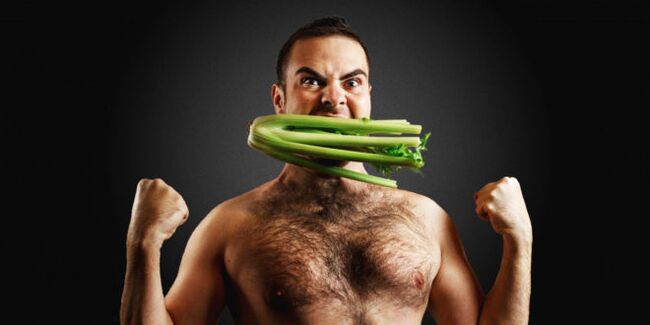 Homme fort avec céleri